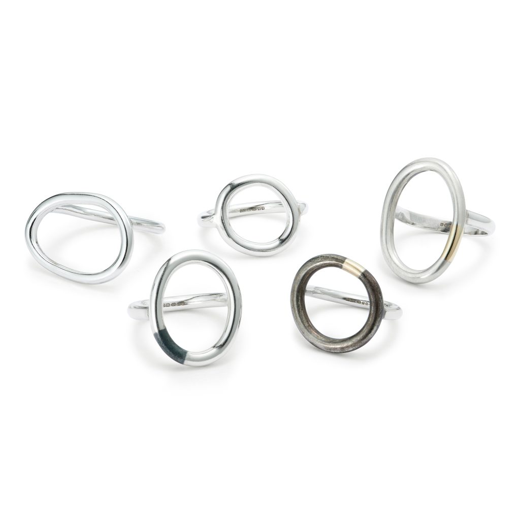 Sterling silver Halo ring collection. Each ring has a different detail including polished finish or matte finish, 9ct yellow gold or oxidised sections